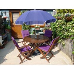 Patio table and 4 chairs with parasol