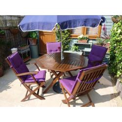 Patio table and 4 chairs with parasol
