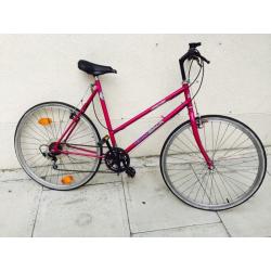 Purple ladies hybrid bike khgfxggvgg