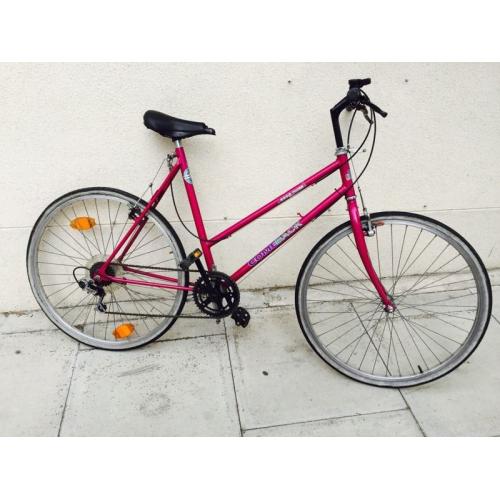 Purple ladies hybrid bike khgfxggv