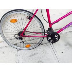 Purple ladies hybrid bike khgfxggvgg