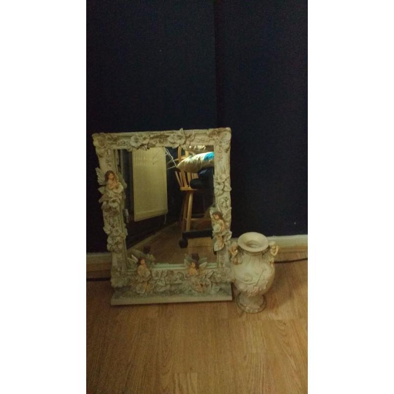 Antique mirror with vase