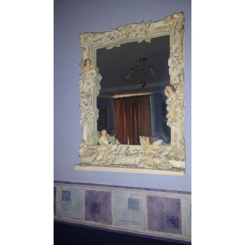 Antique mirror with vase
