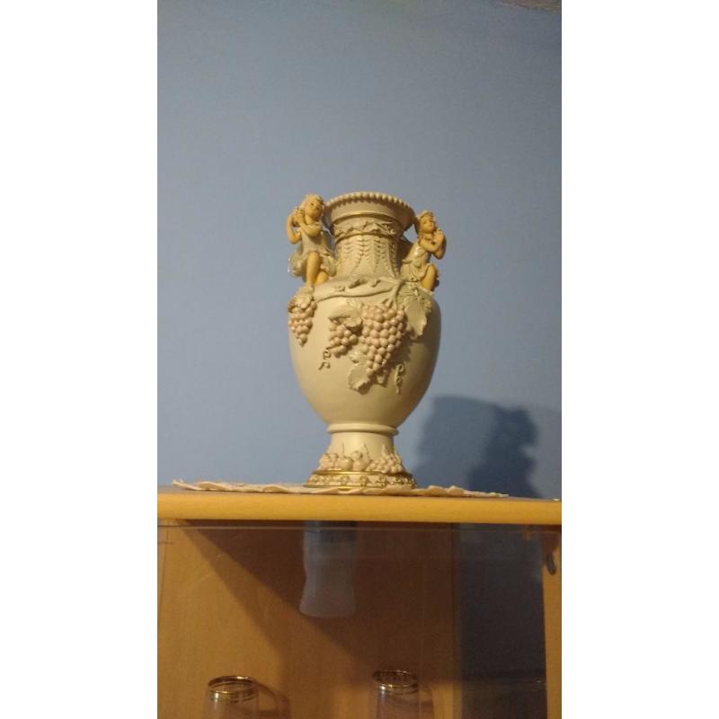 Antique mirror with vase