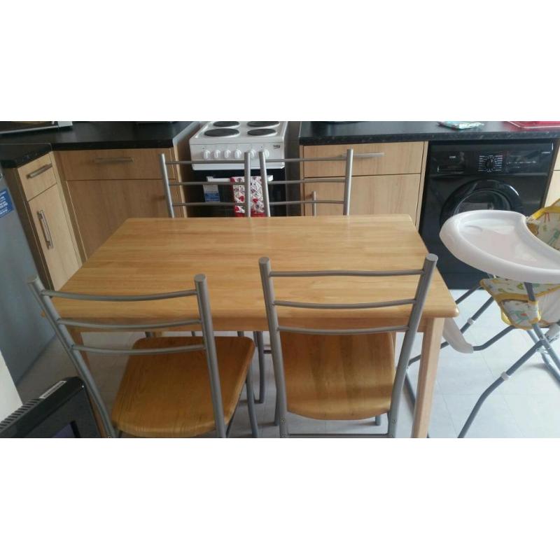 Table & 4 chairs for sale
