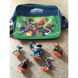 Skylanders figures, bag and book