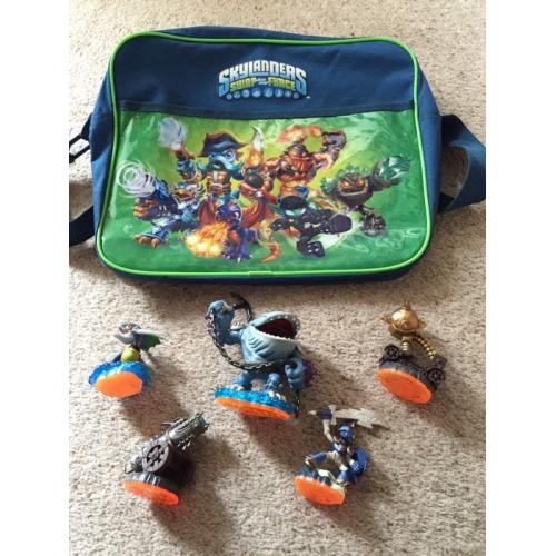 Skylanders figures, bag and book