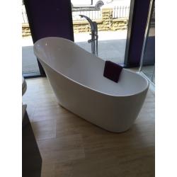 Free standing designer bath with free standing tap