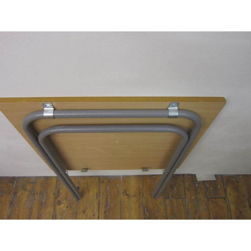 Small folding table for sale .