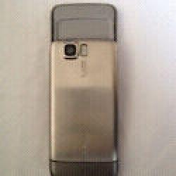 Nokia 6600i open to all network Slide mobile phone, in good condition, stainless steel silver body