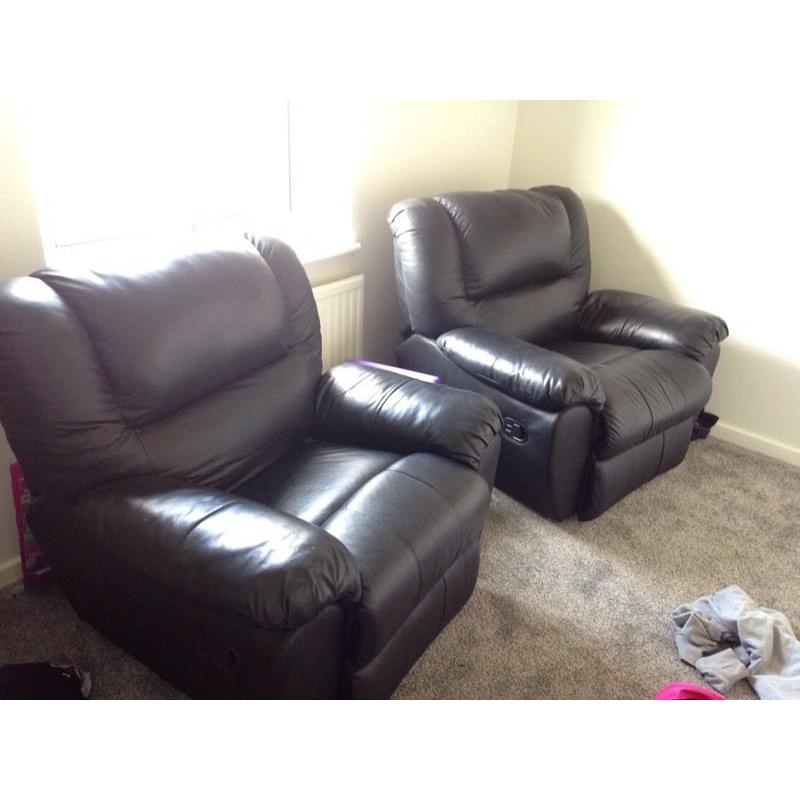 2 leather reclining chairs