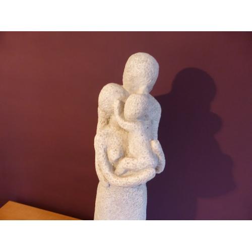 Lovely stone carved ornament of Mum Dad and Baby