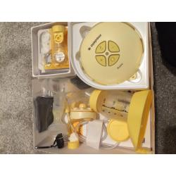 Medea Swing Single Electric Breastpump & Spare Valve Replacements