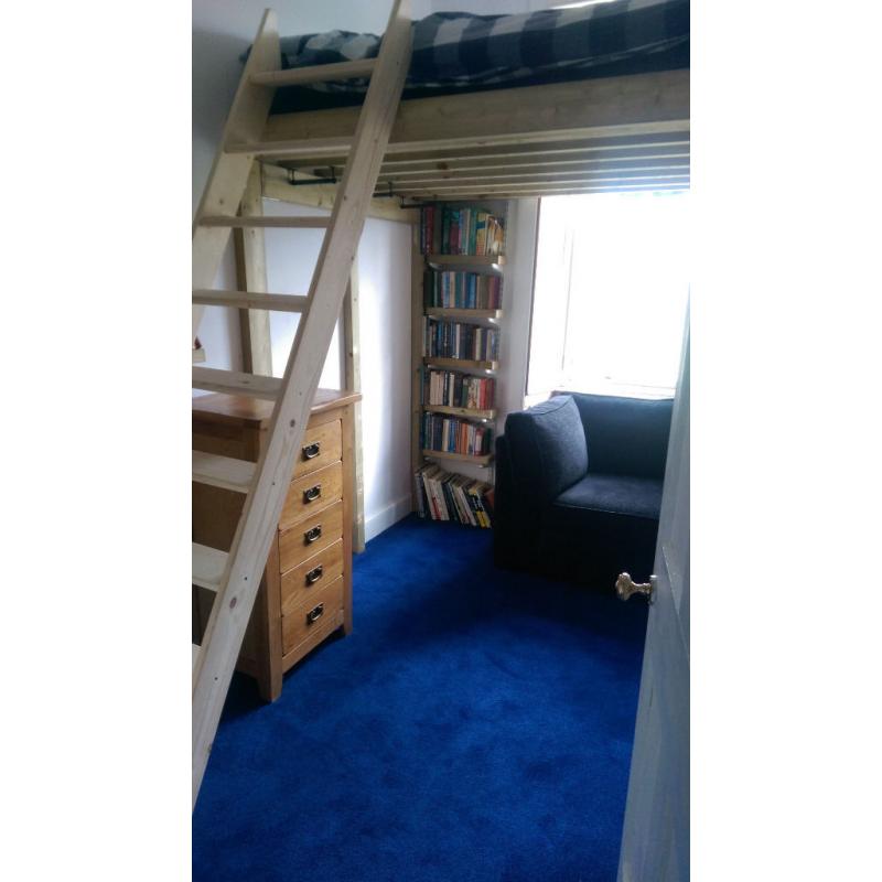 A double bed with views to the very top of Arthur's Seat!