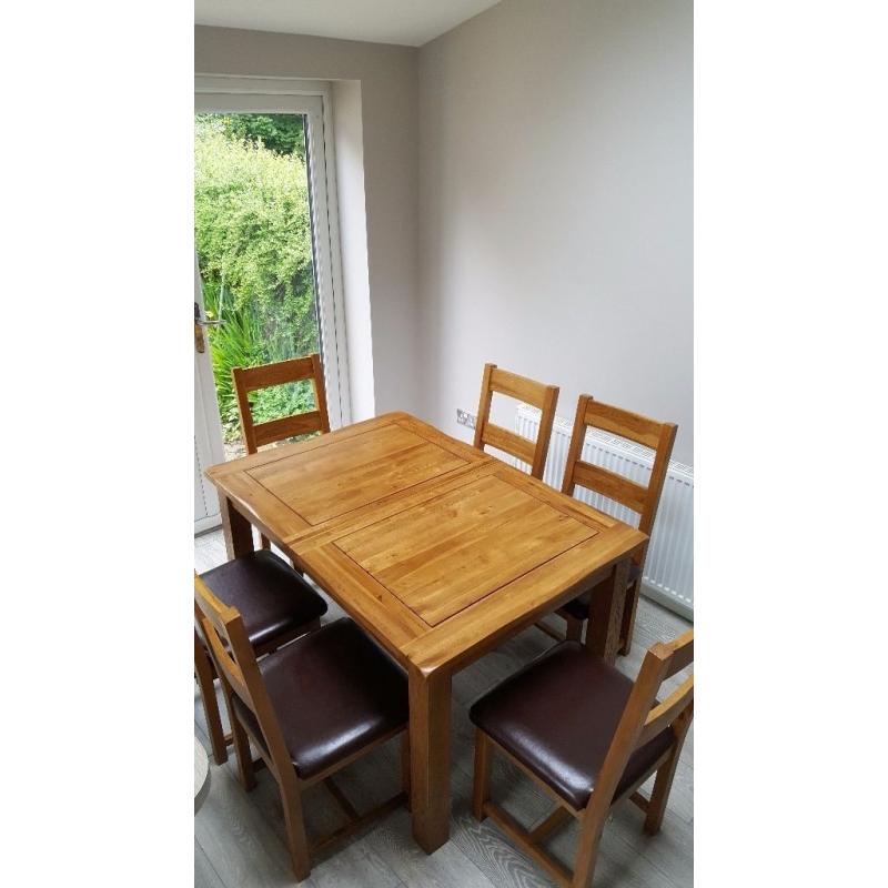 Solid oak extending table & 6 oak leather chairs