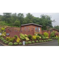 Two bedroom luxury lodge for sale on Drimsynie Estate, Lochgoilhead with annual fee paid.