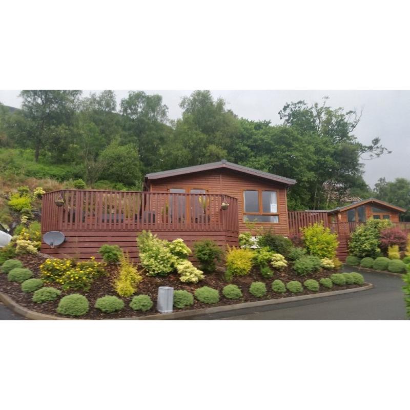 Two bedroom luxury lodge for sale on Drimsynie Estate, Lochgoilhead with annual fee paid.