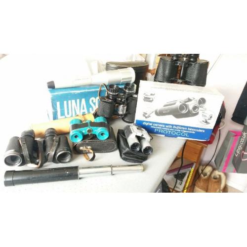 Assortment of binoculars and telecopes