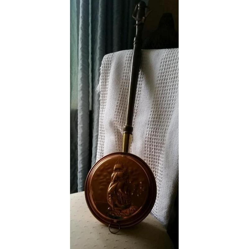 Antique copper bed warmer