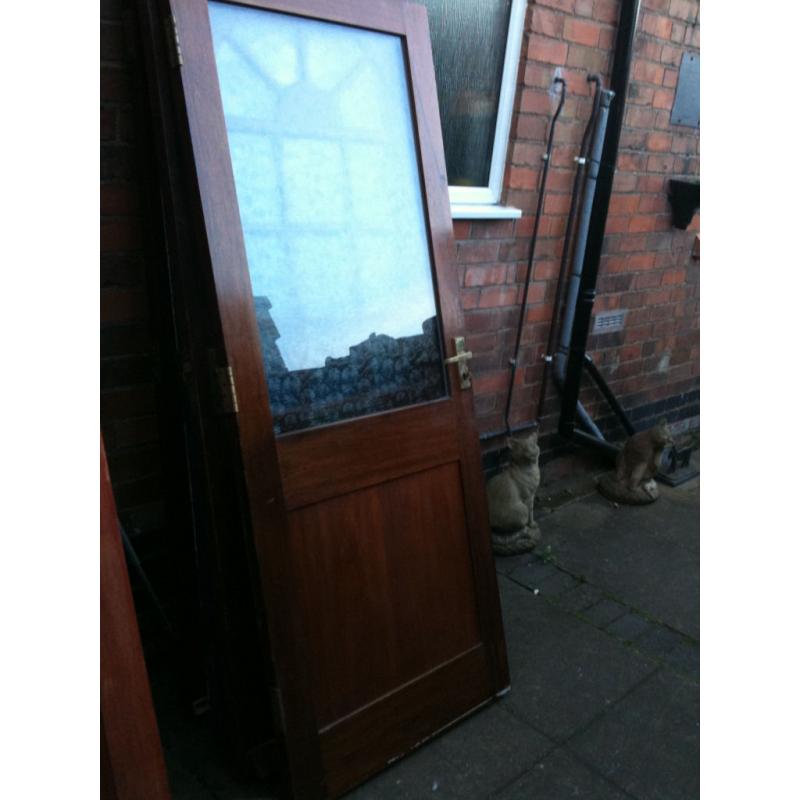 Hardwood door with toughened frosted glass panel