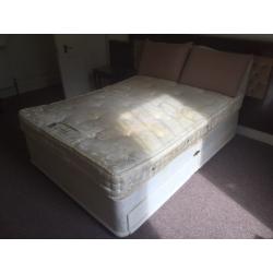 Double bed with mattress and 4 drawers and headboard. Can deliver.