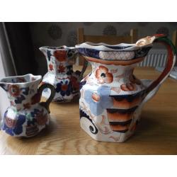 Three old graduated masons ironstone octagonal jugs.
