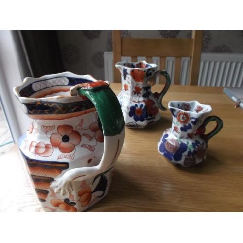 Three old graduated masons ironstone octagonal jugs.