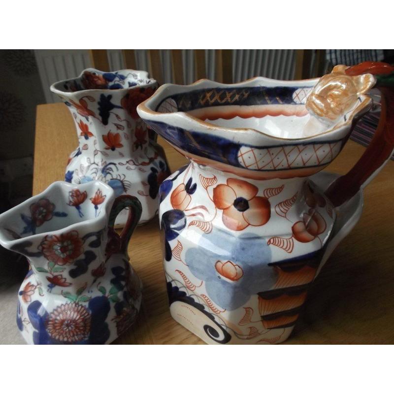 Three old graduated masons ironstone octagonal jugs.