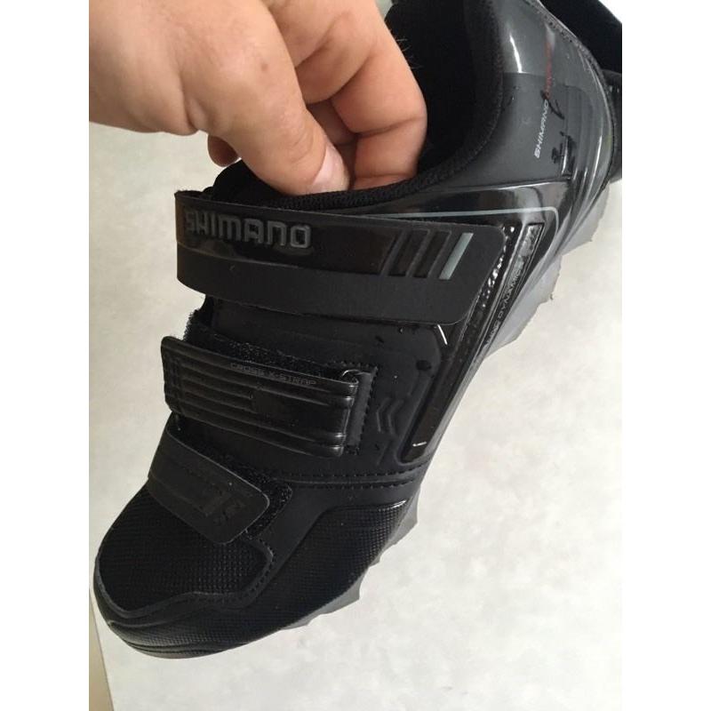 Brand new shimano cycling shoes with cleats. Swap