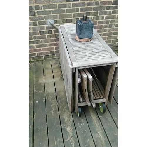 Outside garden collapsible dining table and 4 chairs