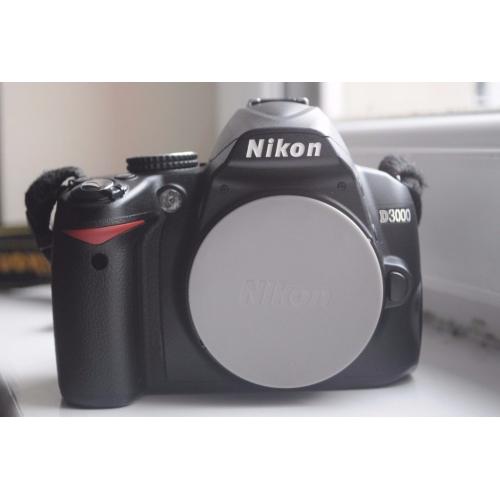 Nikon D3000 DSLR with 18-55mm Nikkor lens and accessories