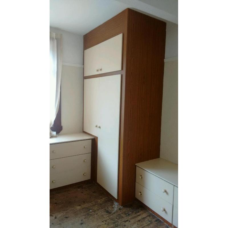 Free built in bedroom storage with large tinted mirrors