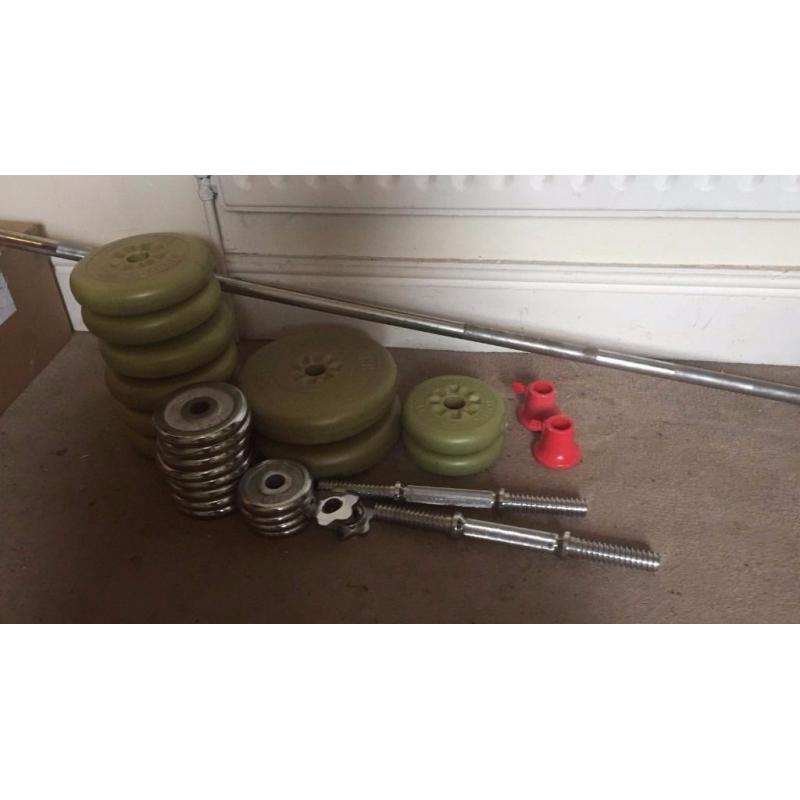 Weight plates. Dumbbells and Barbell.