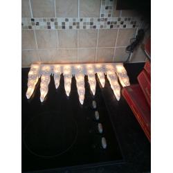 30 framed silhouette icicle lights for indoor use.