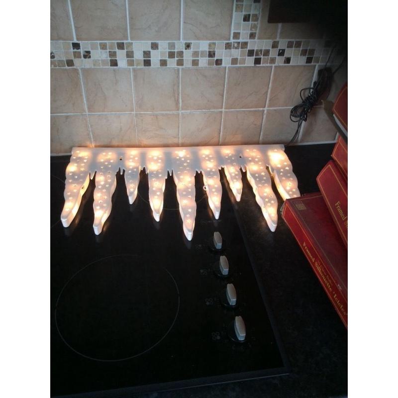 30 framed silhouette icicle lights for indoor use.