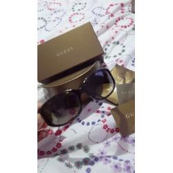 Genuine brown Gucci sunglasses. Used once or twice but in perfect condition