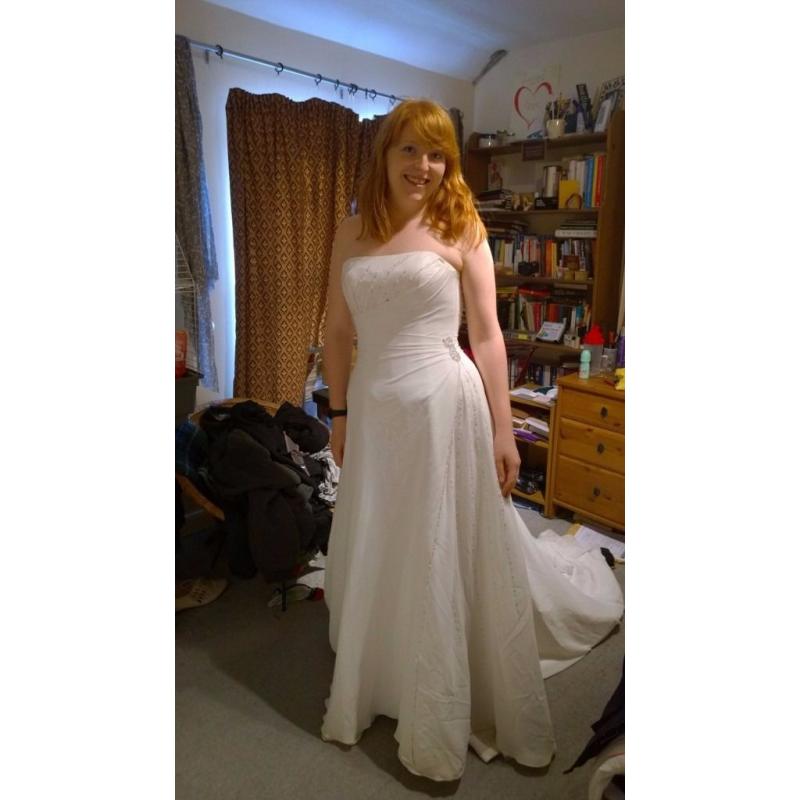 Maggie Sottero strapless wedding gown with train