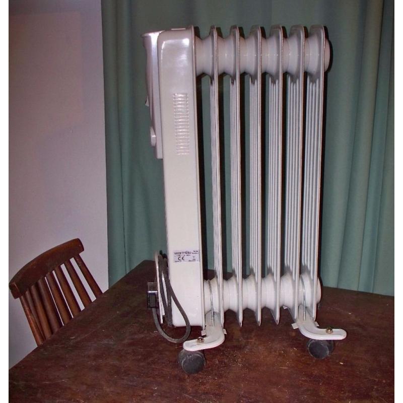 1500 watt [1.5 kw] white warmlite oil heater radiator