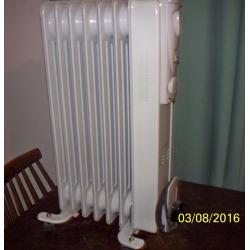 1500 watt [1.5 kw] white warmlite oil heater radiator