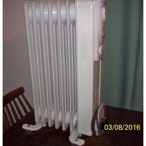 1500 watt [1.5 kw] white warmlite oil heater radiator