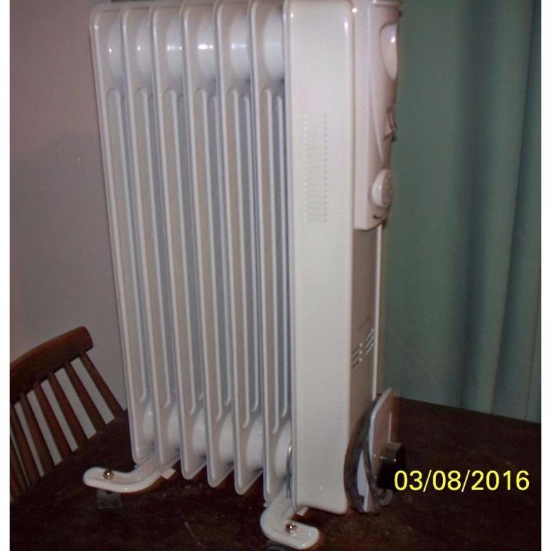 1500 watt [1.5 kw] white warmlite oil heater radiator