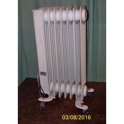 1500 watt [1.5 kw] white warmlite oil heater radiator