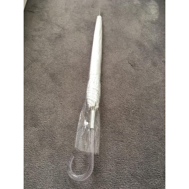 White diamanté wedding umbrella