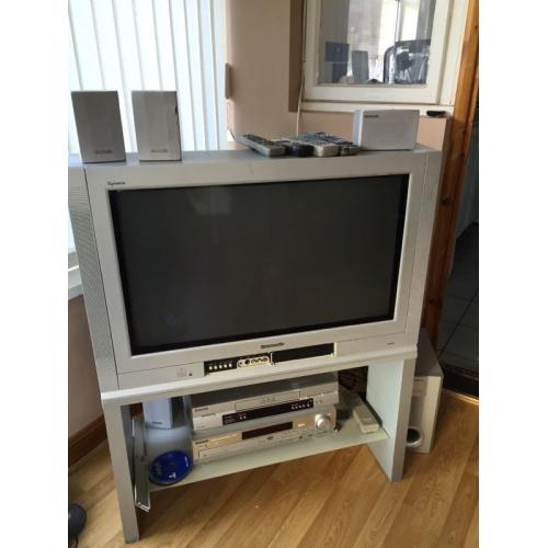 TV with full surround sound, video player and DVD player