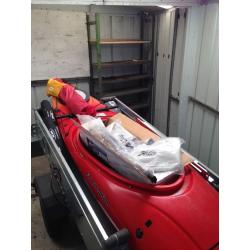 Sea kayak with stabilisers