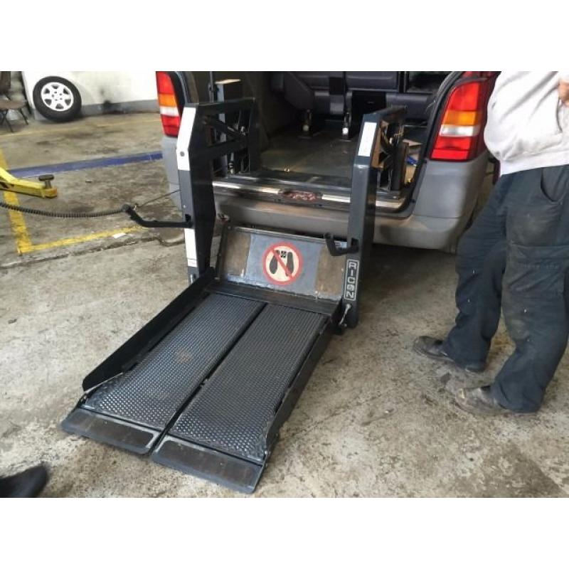 Taxi wheelchair lift