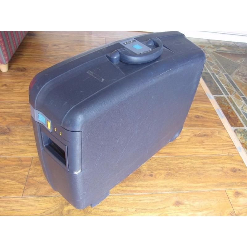 Delsey hard suitcase on wheels