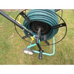 Garden hose on a trolley
