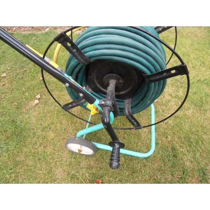 Garden hose on a trolley