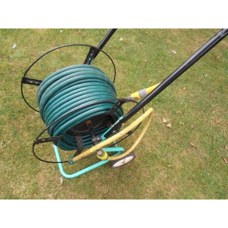 Garden hose on a trolley